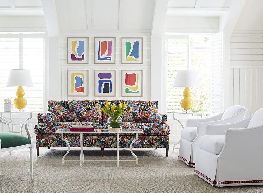 The floral sofa acts as a traditional centerpiece for the otherwise contemporary living room