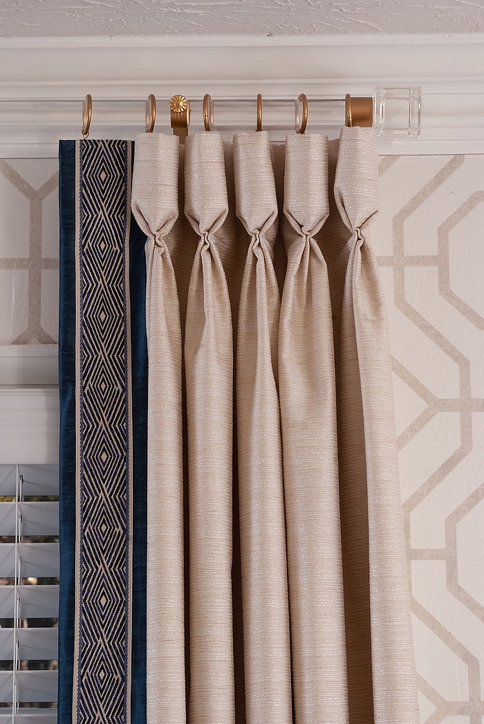Custom window treatments give you the opportunity to show beautiful pleats and decorative trim.