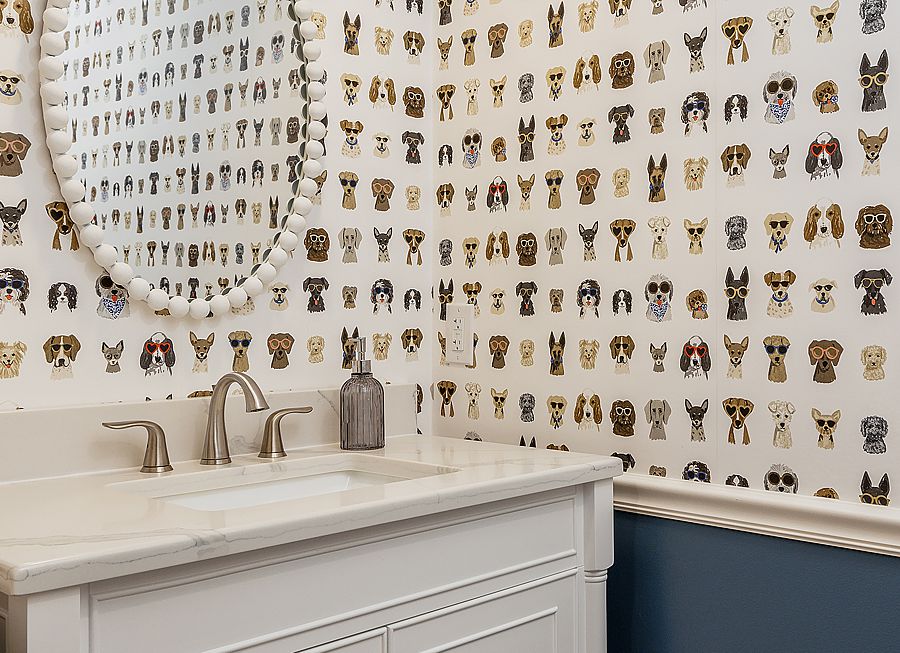 Whimsical wallpaper in a powder room will make visitors smile.